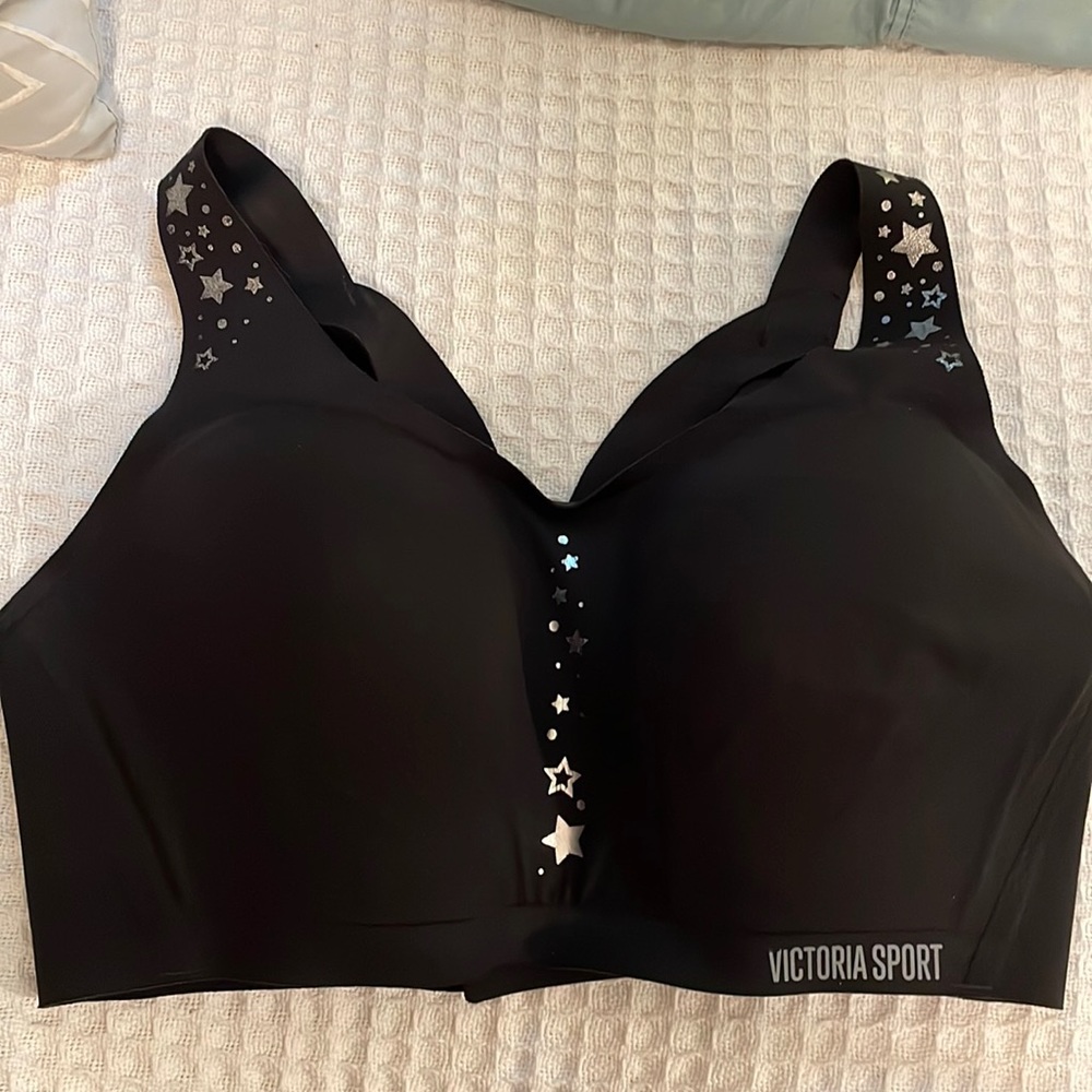 Victoria’s Secret sports bra 34DD in black with really cute silver star pattern